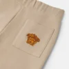 Dětské vyšívané bavlněné jersey tepláky